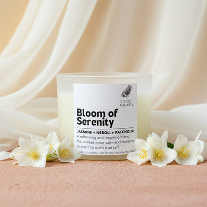 Candle labeled 'Bloom of Serenity' by Studio Vikara on a beige background