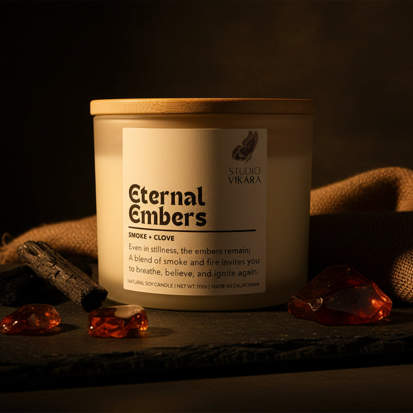Candle with 'Eternal Embers' label on a white background