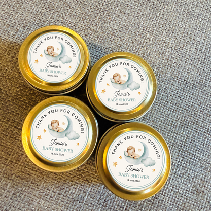 Gold tin candles with baby shower labels
