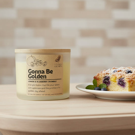 Candle with 'Gonna Be Golden' label on a white background